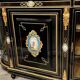 Napoleon III style credenza with four Sèvres medallions.