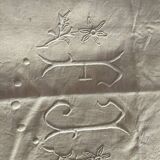 Old embroidered sheet, monogram F J
