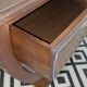 Half-moon commode