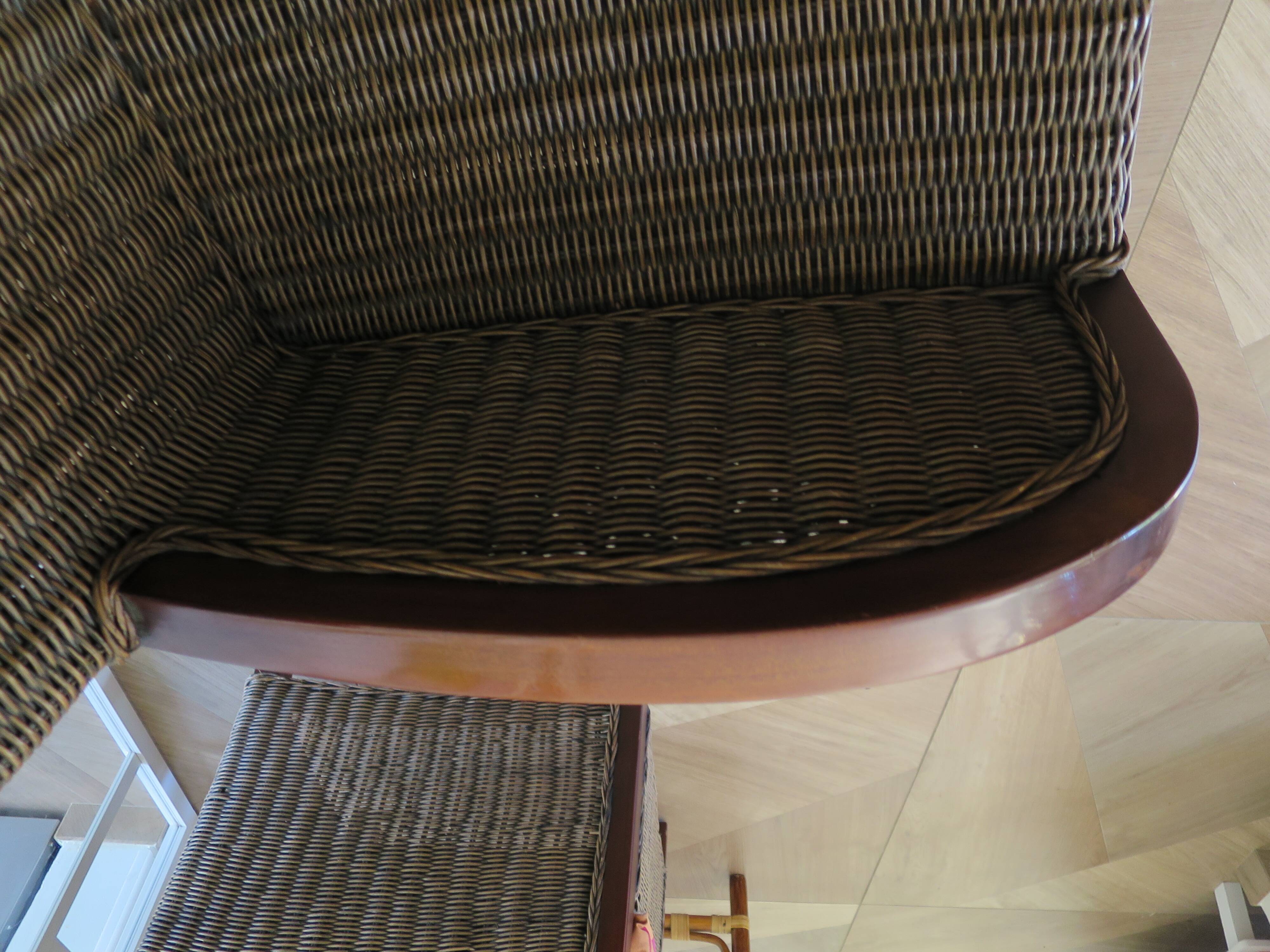 2 armchairs in woven rattan and wood, 1980s