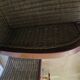 2 armchairs in woven rattan and wood, 1980s