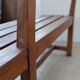 Large wooden bench with a backrest