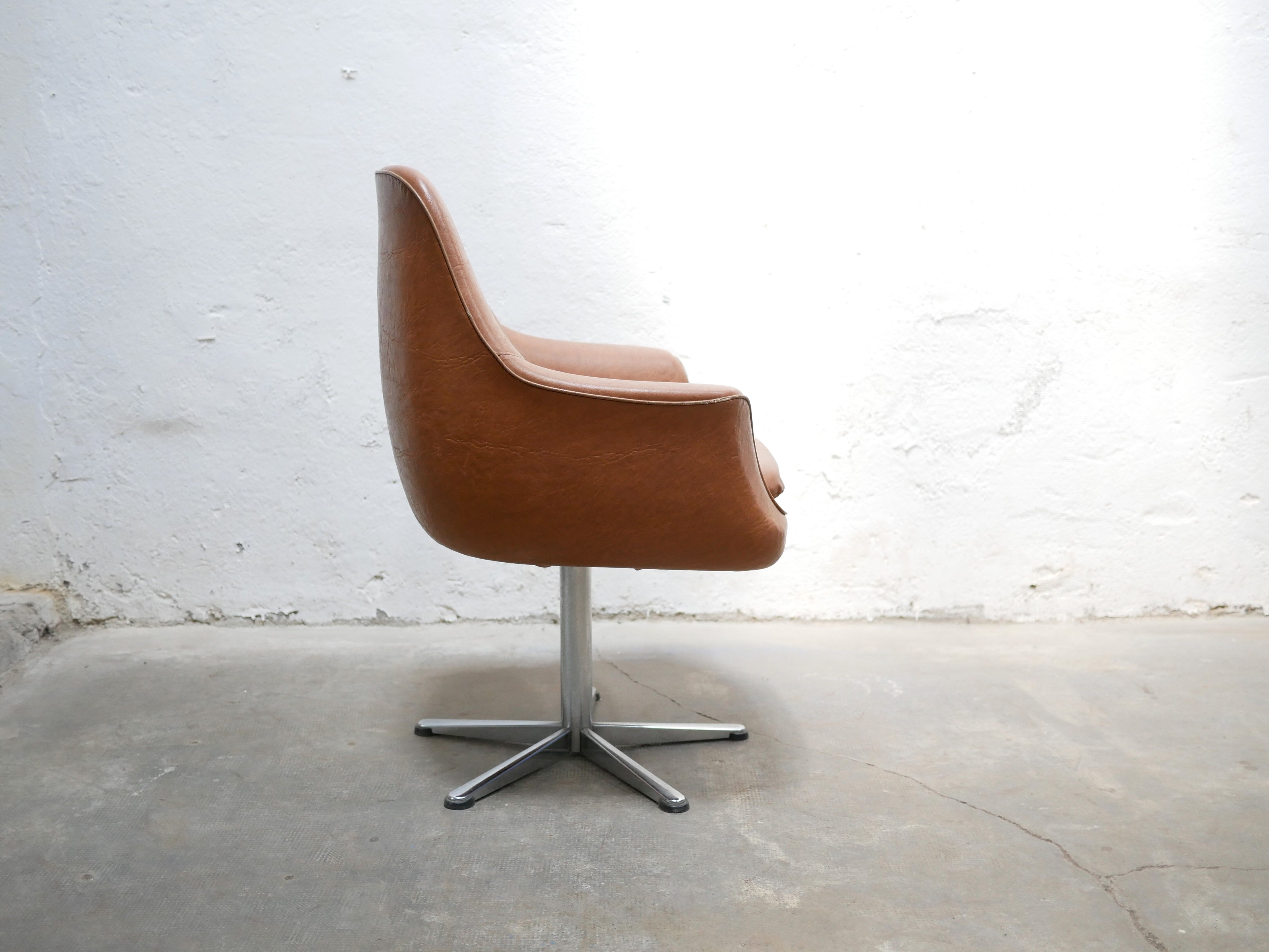 Vintage swivel desk chair in imitation leather