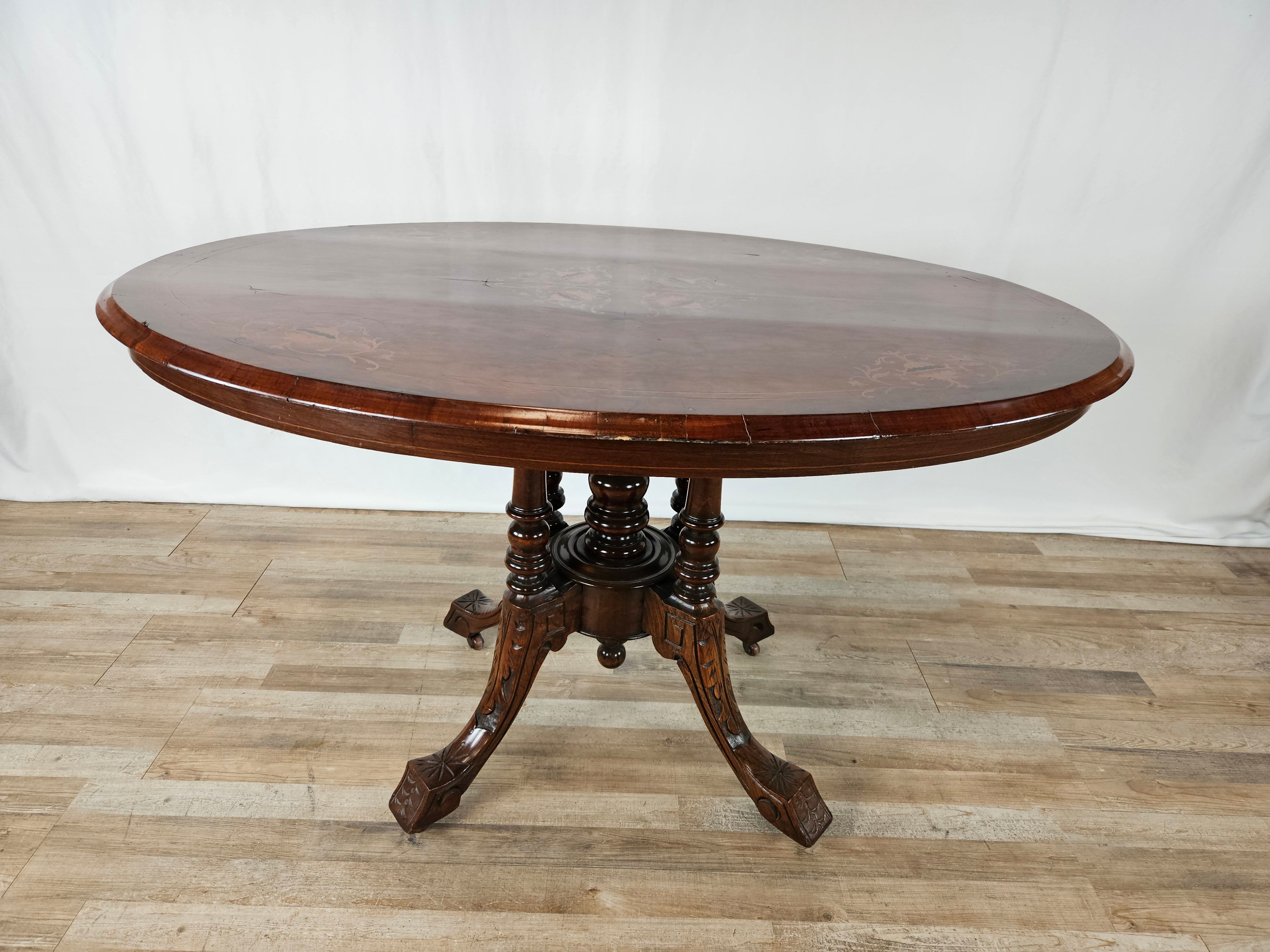 Coffee table in walnut with maple inlays and wheels