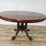 Coffee table in walnut with maple inlays and wheels