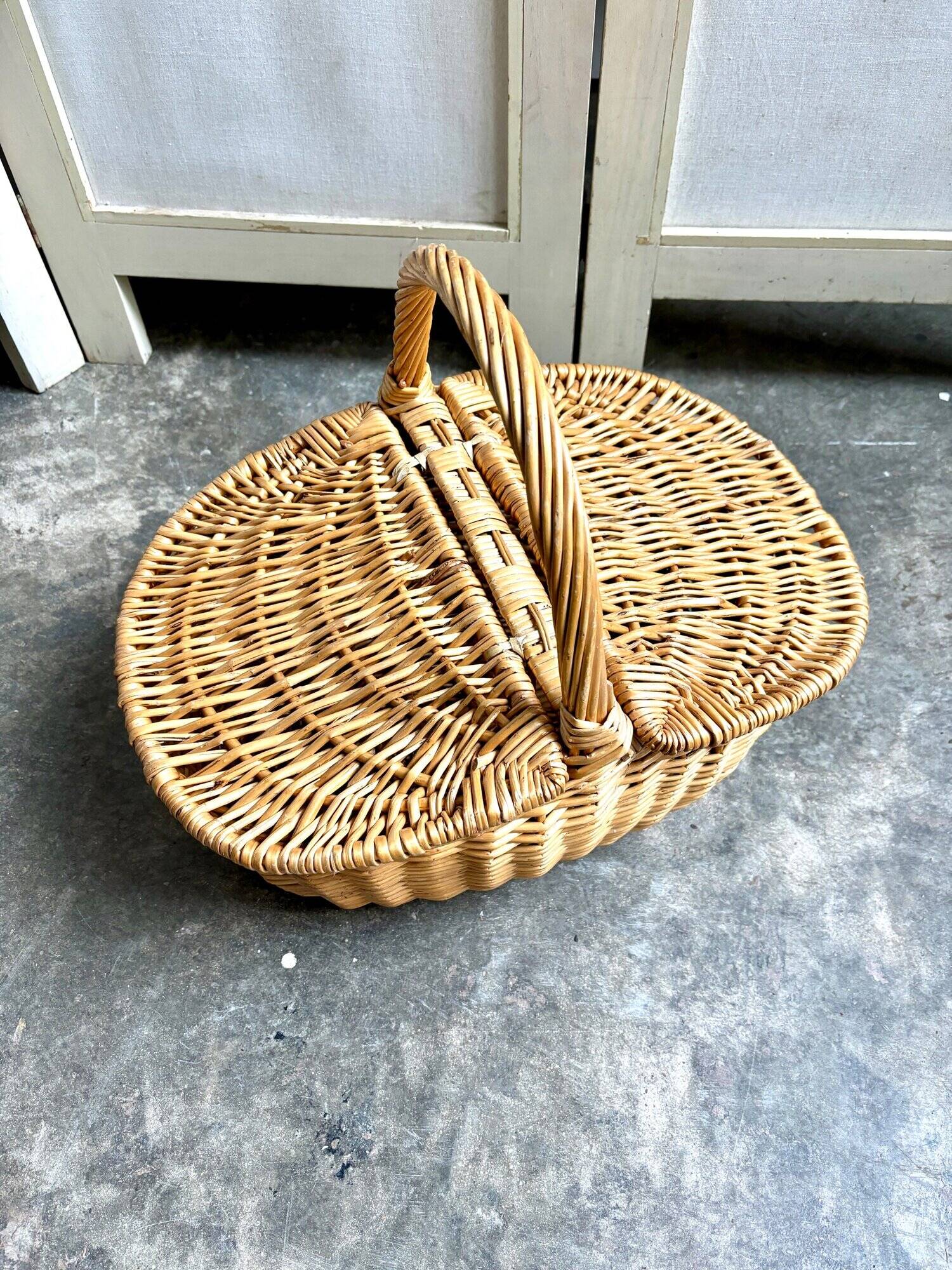 Woven wicker picnic basket