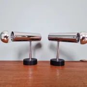 Pair of chrome metal wall lights, Staff Leuchten, Germany, 1970.