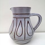 Vintage pitcher in enamelled earth