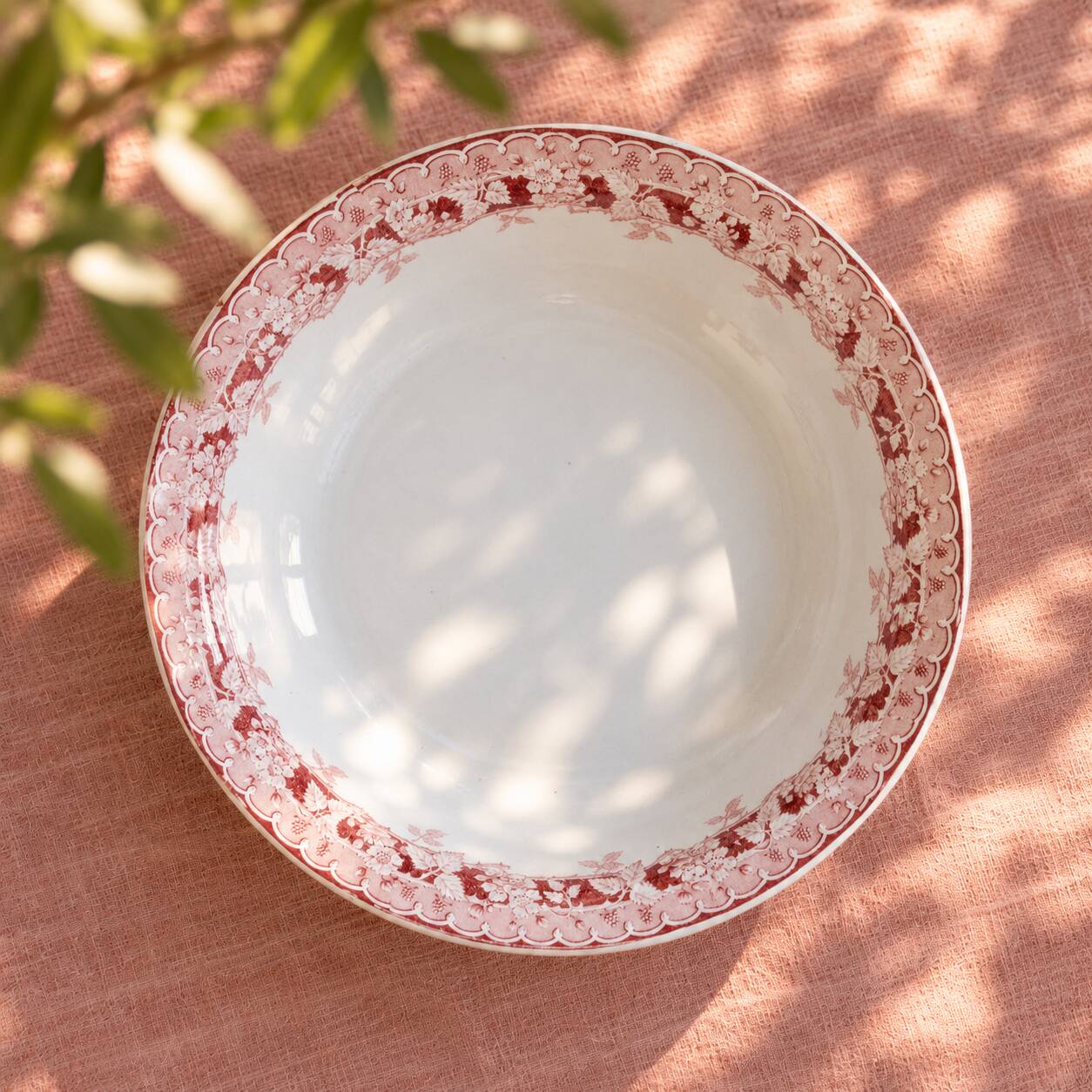 Pink ironstone salad bowl signed St Amand, Mûrier collection.