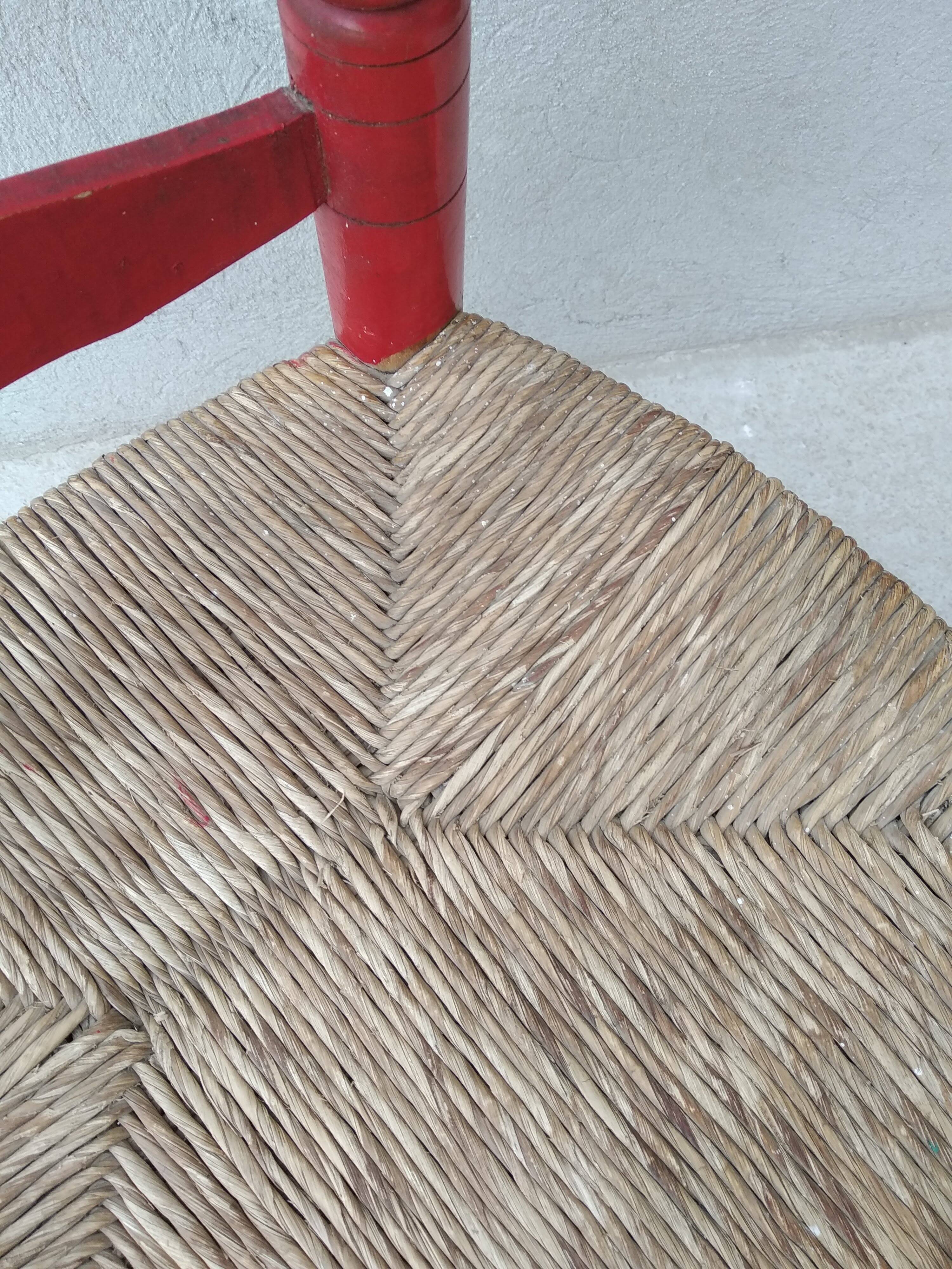 2 vintage red straw chairs