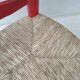 2 vintage red straw chairs