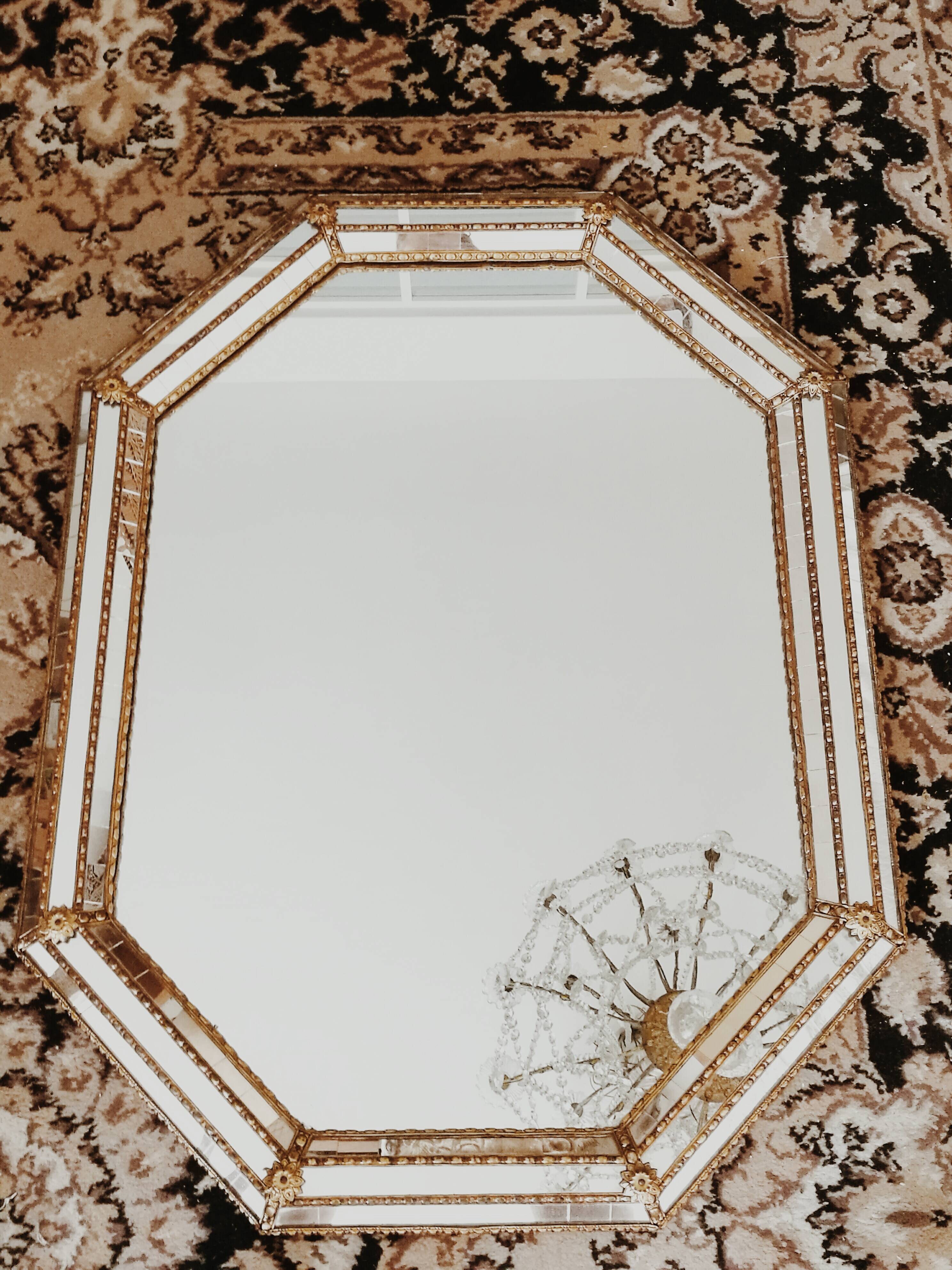 Old mirror with parecloses