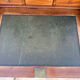 A small piece of Bonheur du jour with detached columns in Empire-era mahogany.