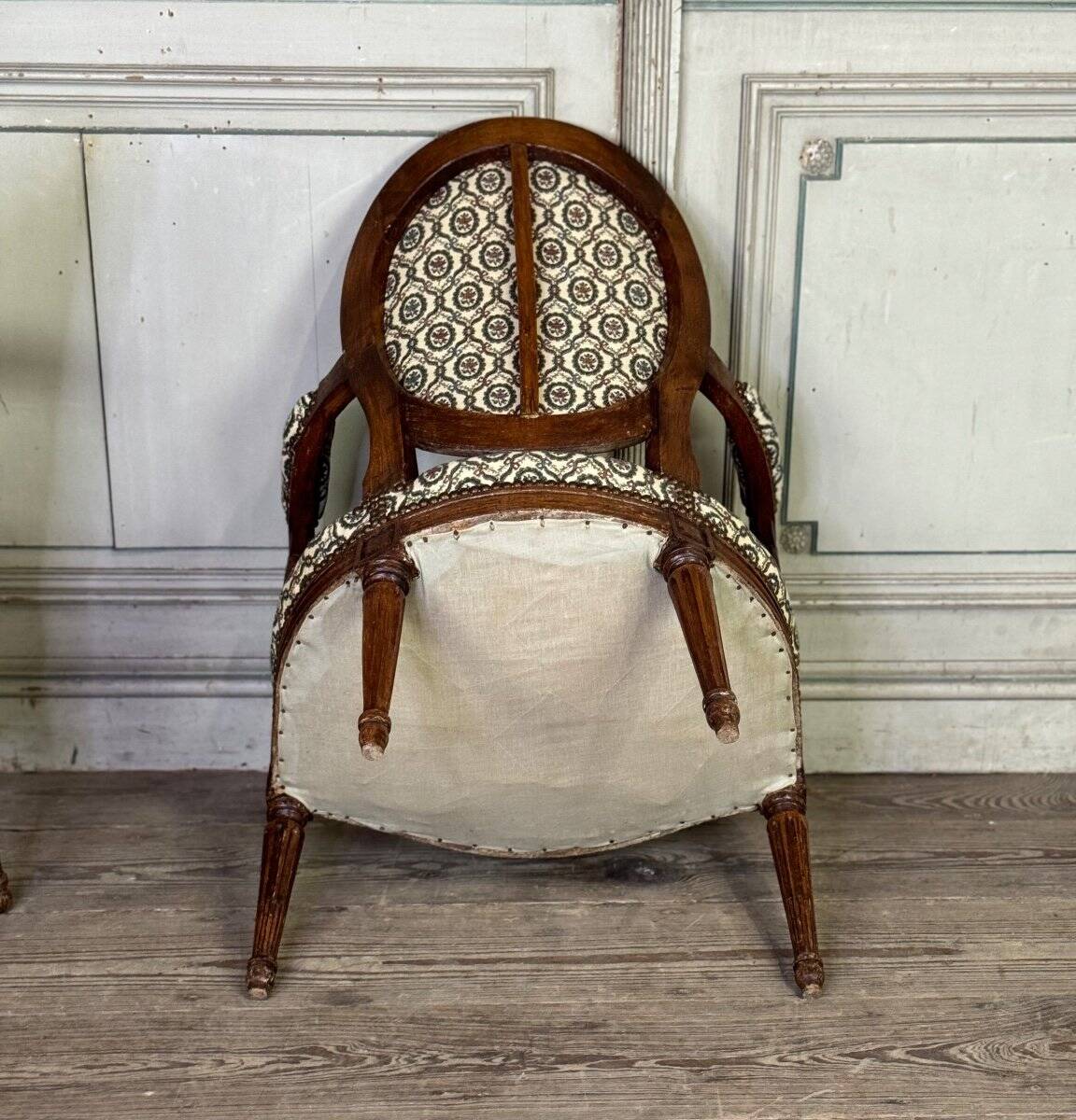 Pair Of Louis XVI Armchairs In Carved Wood, 18th Century