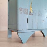 Old blue wood bedside table