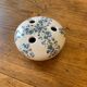 Ceramic flower pique