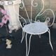Paire de fauteuils de jardin en fer forgé