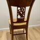 19th century straw chair with carved peacock back