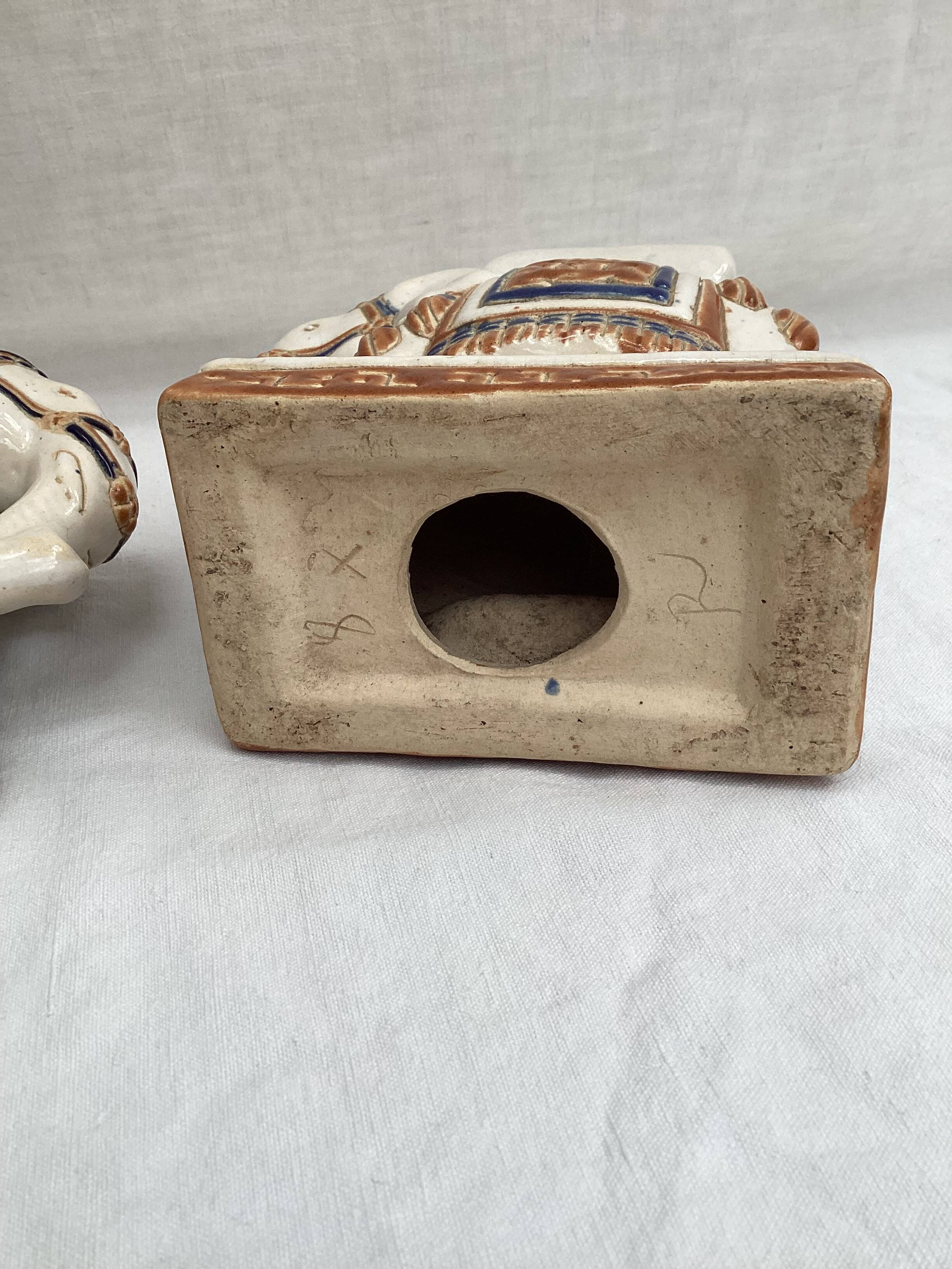 Pair of ceramic elephant ashtrays dimensions: height -14cm- width -13.5cm-