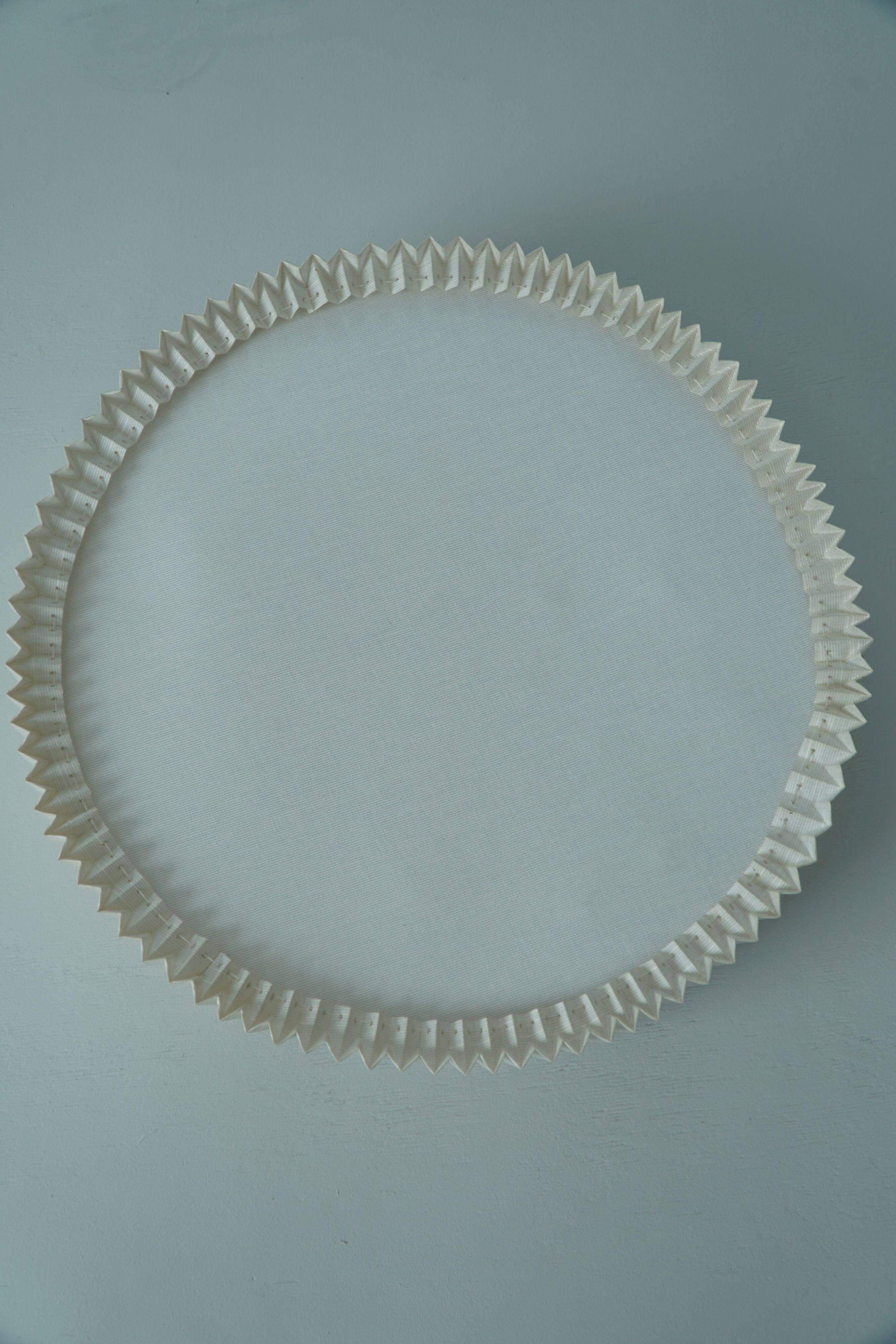 Modern mid-century ceiling/wall lamp from the 1950s in linen, made in Sweden.