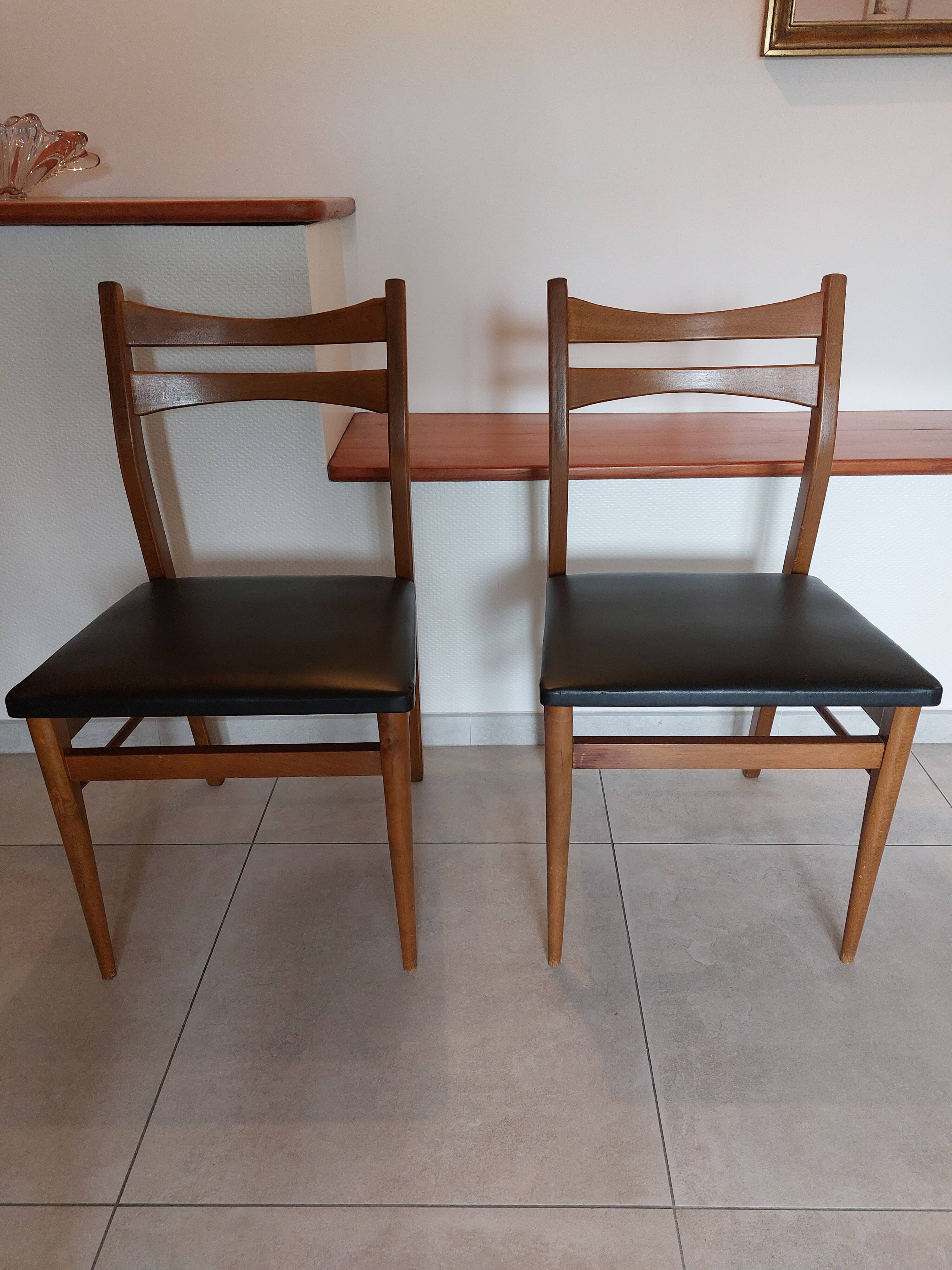 5 Scandinavian style chairs, wood and black faux leather.