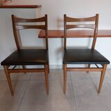 5 Scandinavian style chairs, wood and black faux leather.