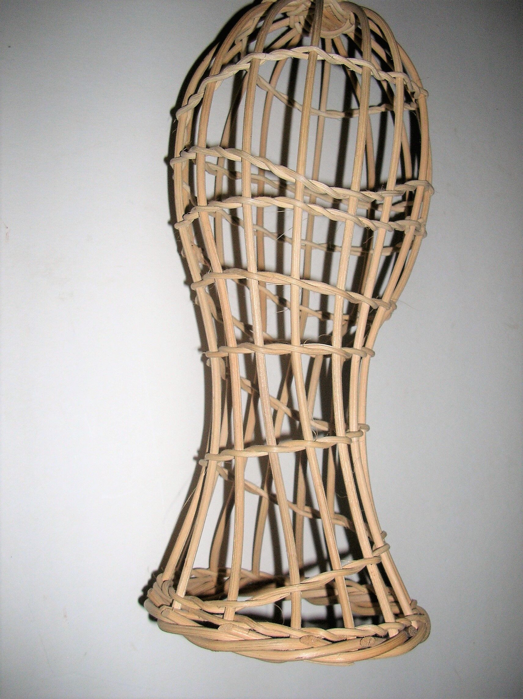 Model head in rattan
