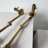 Pair of brass wall lights with articulated arms from the 70s