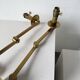 Pair of brass wall lights with articulated arms from the 70s