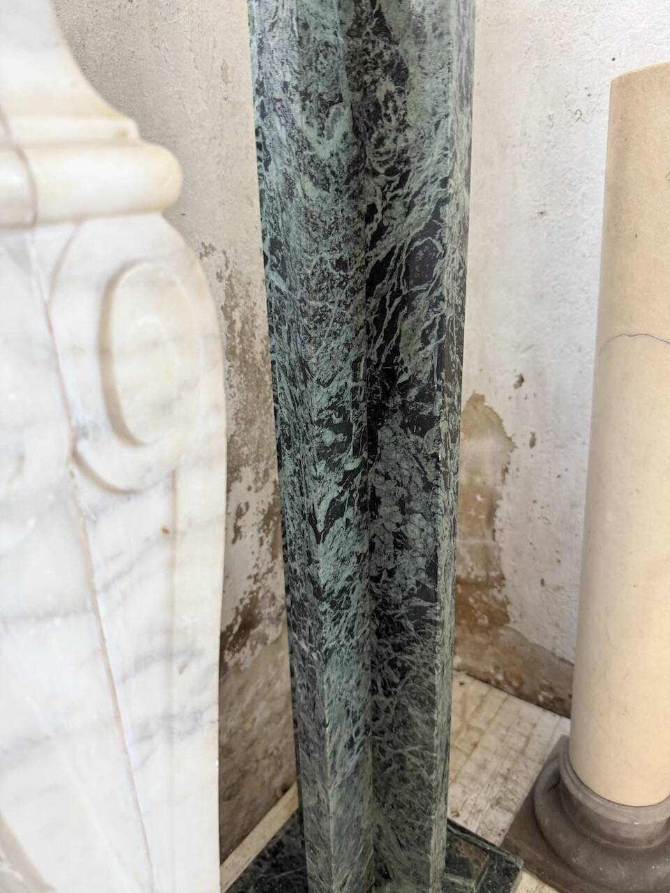 Set of 4 marble columns or pedestals.