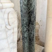 Set of 4 marble columns or pedestals.