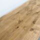 Grande table de salle à manger en chêne massif, au format XXL.