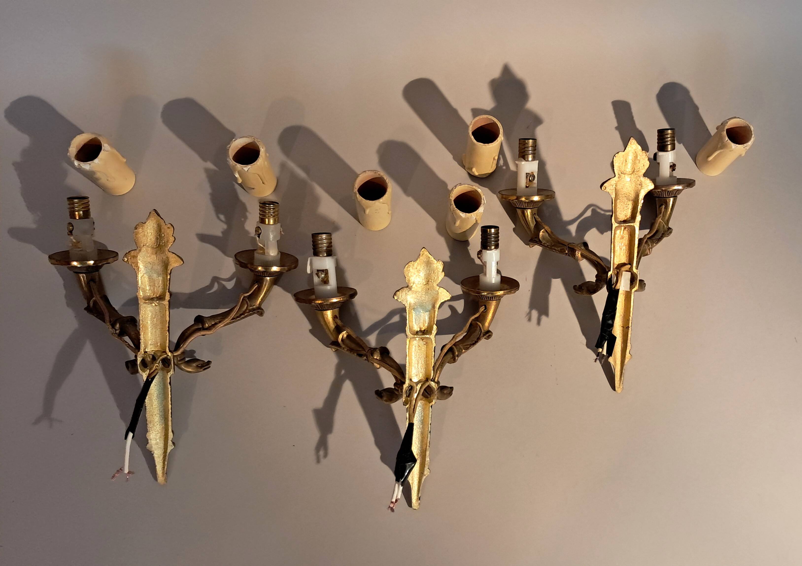 Set of 3 Empire style wall lights in bronze and gilded and green lacquered brass, Circa 1950.