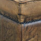 Sturdy square vintage sheepskin pouf/ottoman with beautiful colours