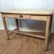 Antique farmhouse table in raw wood