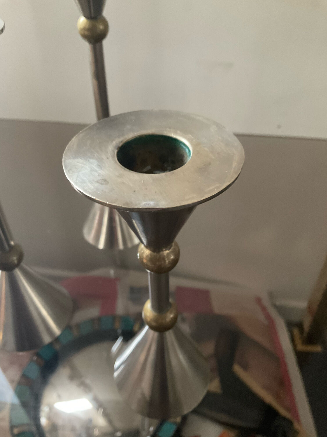 Trio of vintage metal and bronze candle holders