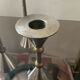Trio of vintage metal and bronze candle holders