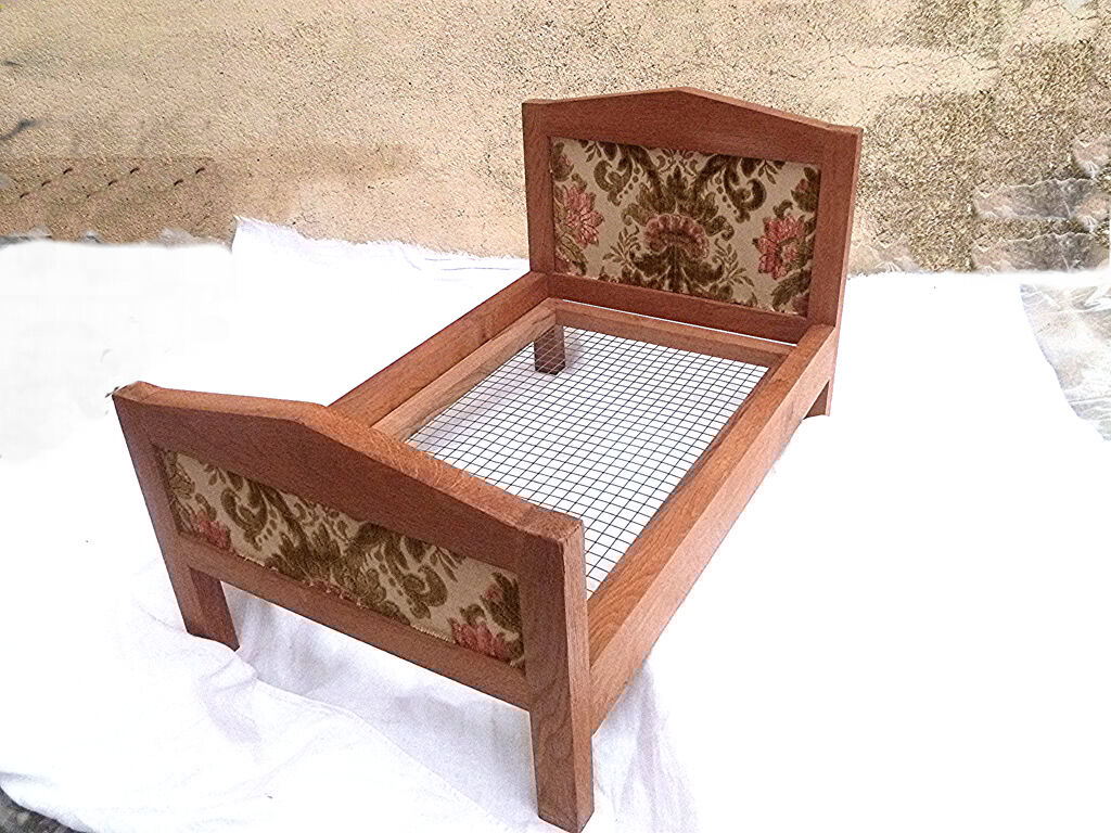 Vintage handcrafted wooden doll bed