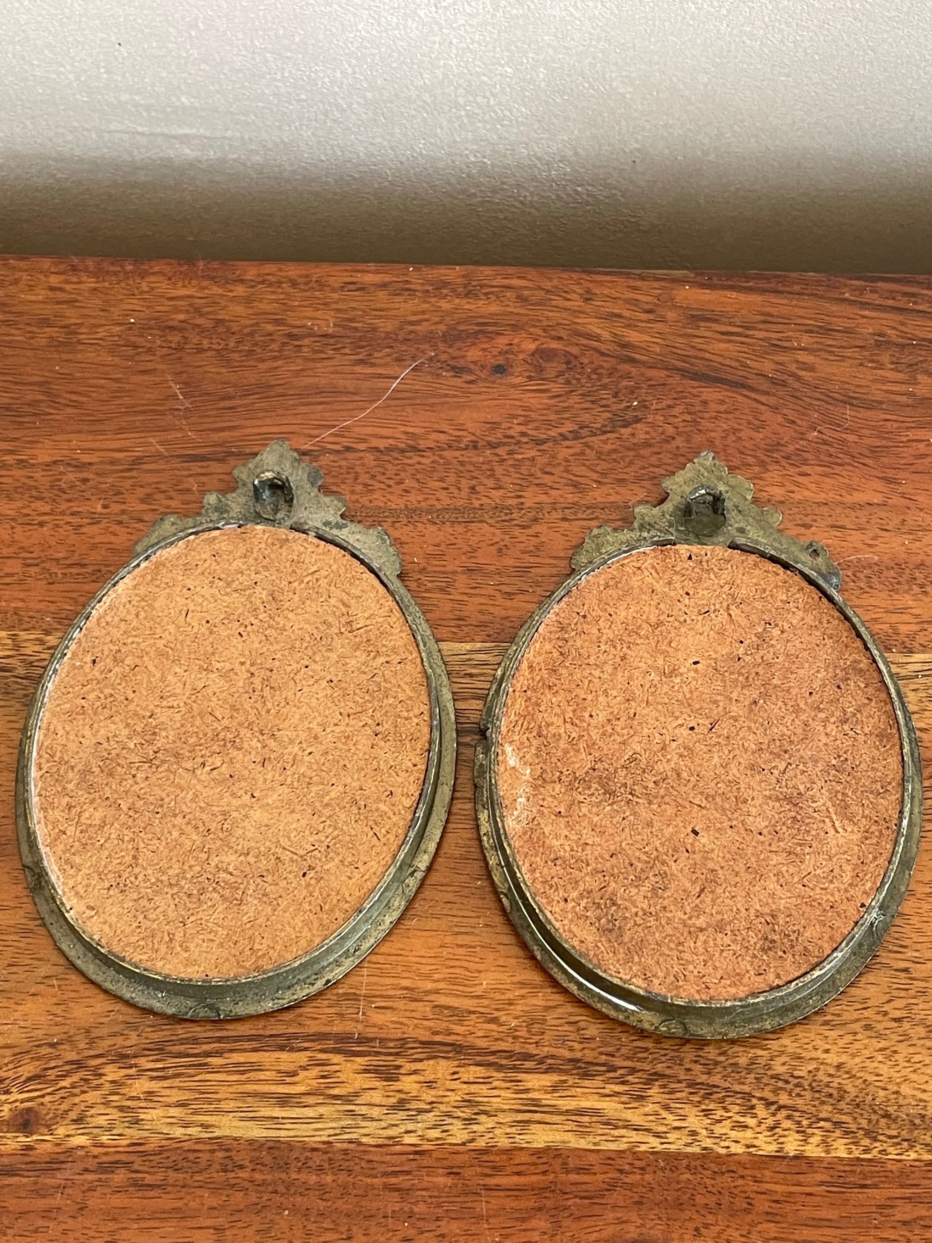 2 oval frames birds on silk