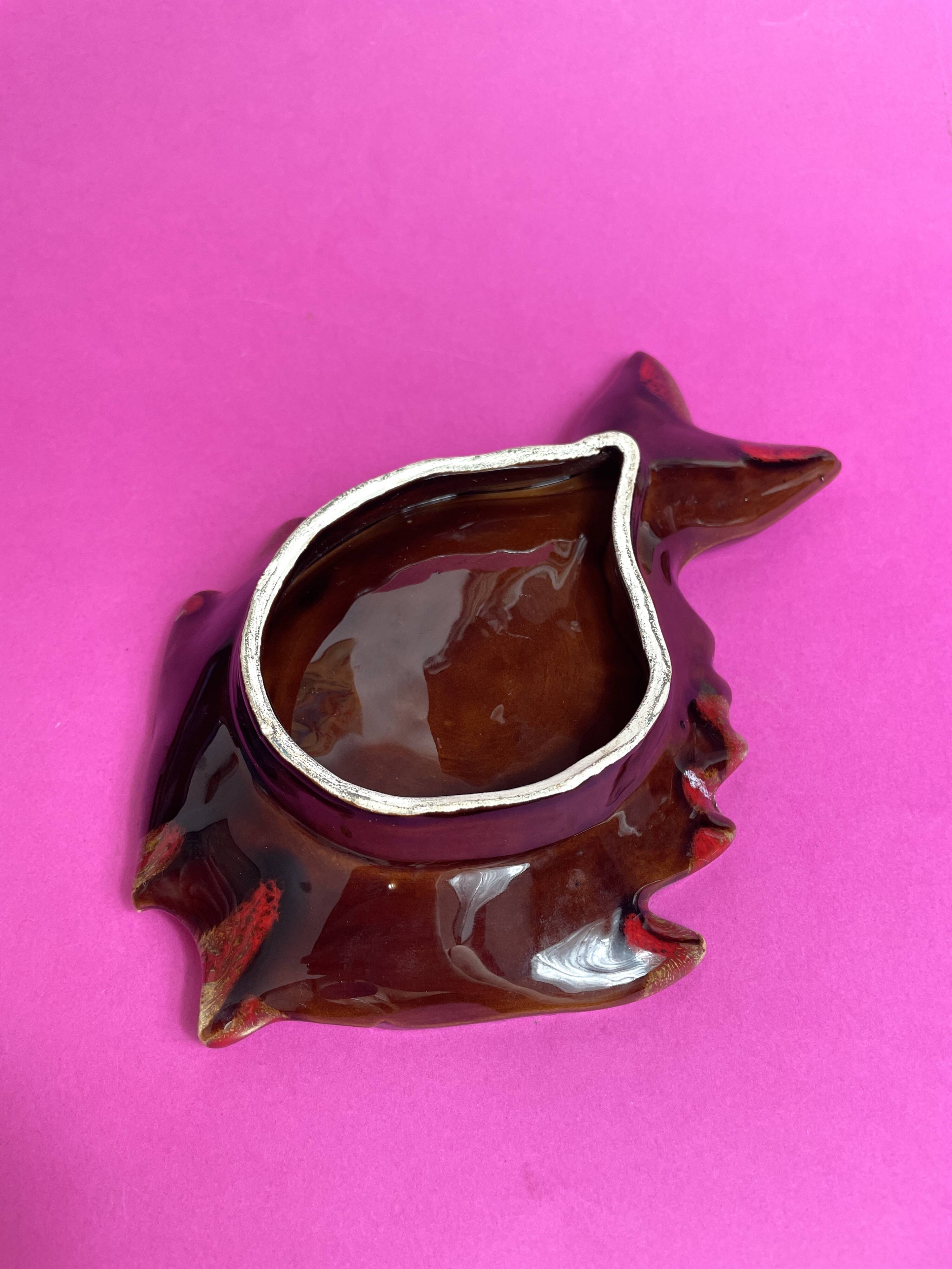 Ceramic pocket emptier