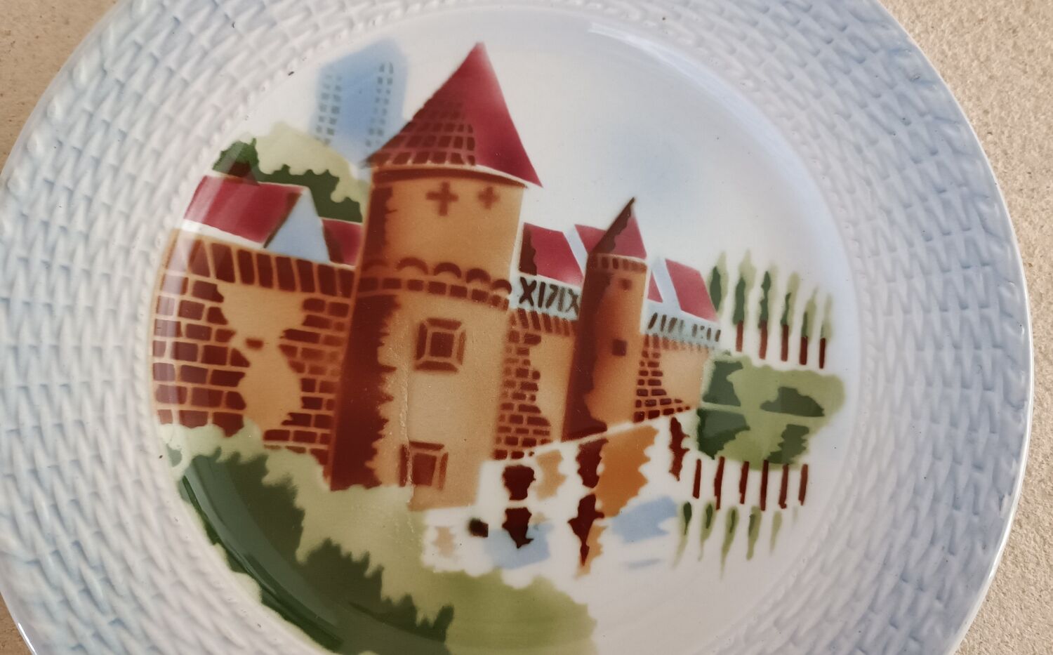 2 Saint Amand plates with castle decor