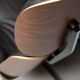 Fauteuil Eames XL et repose-pieds en palissandre de Santos avec cuir chocolat.