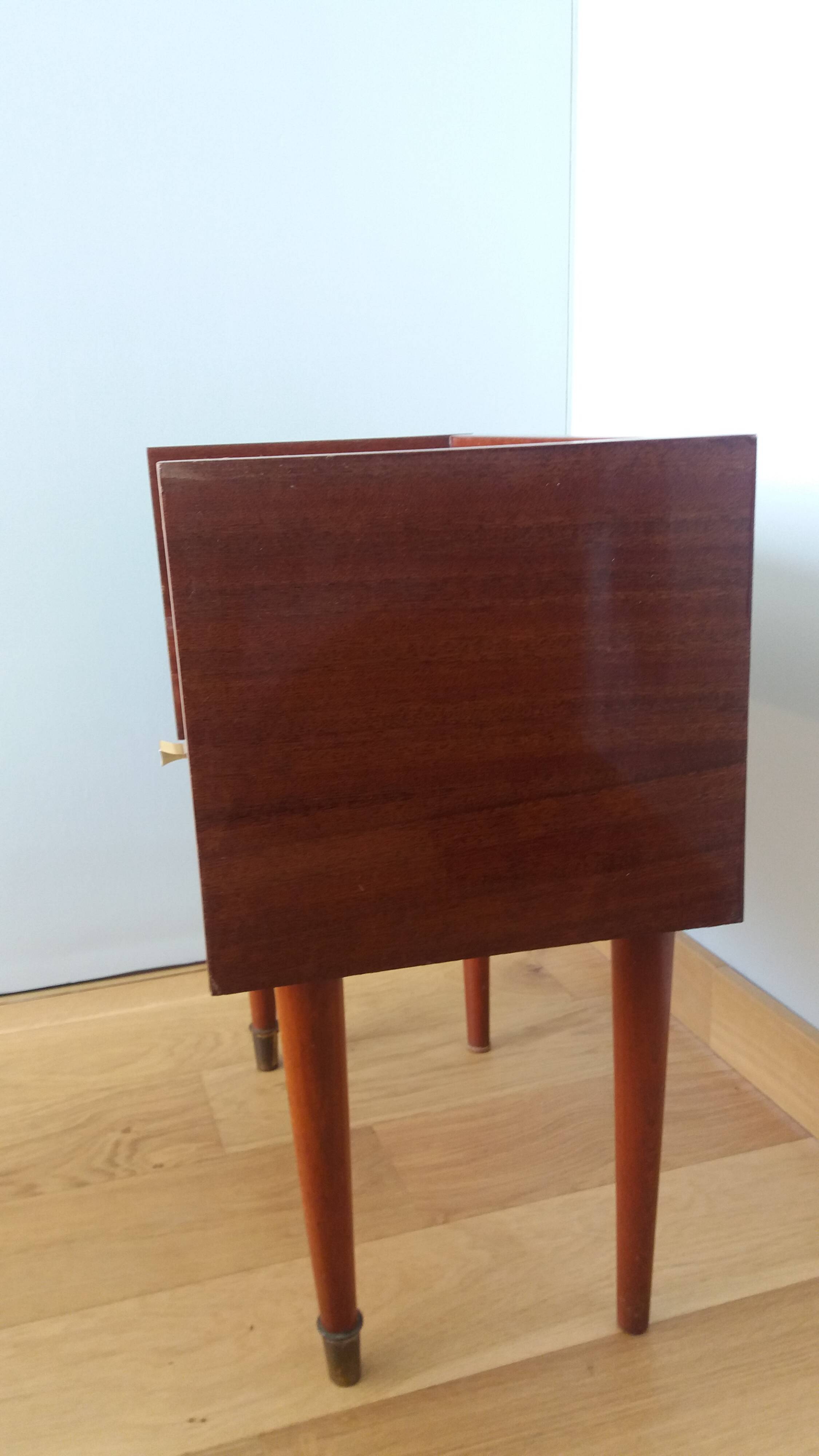 Spindle-legged bedside table