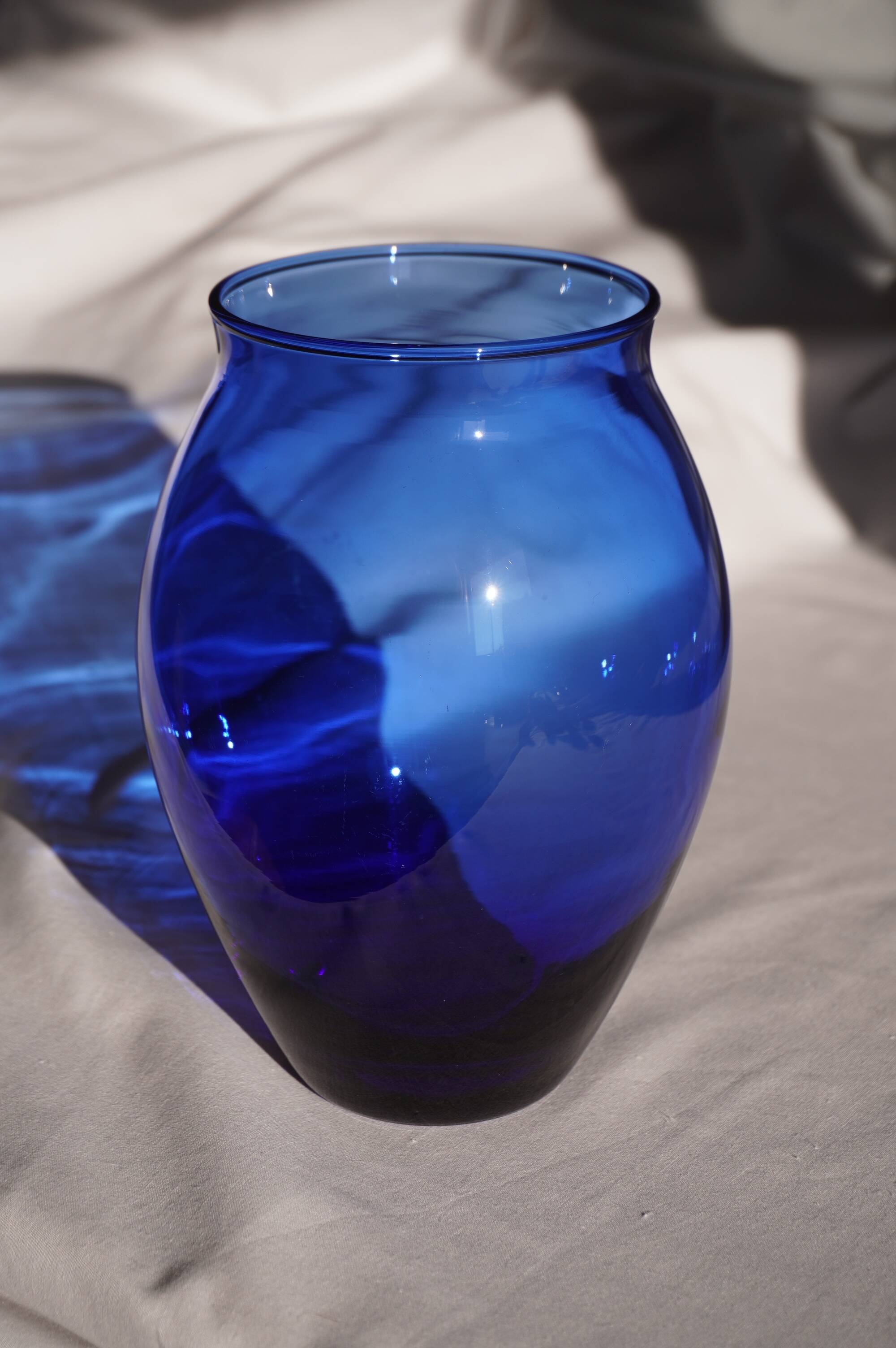 Blue glass vase, oval shape