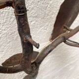 Wall lamp in wrought iron.