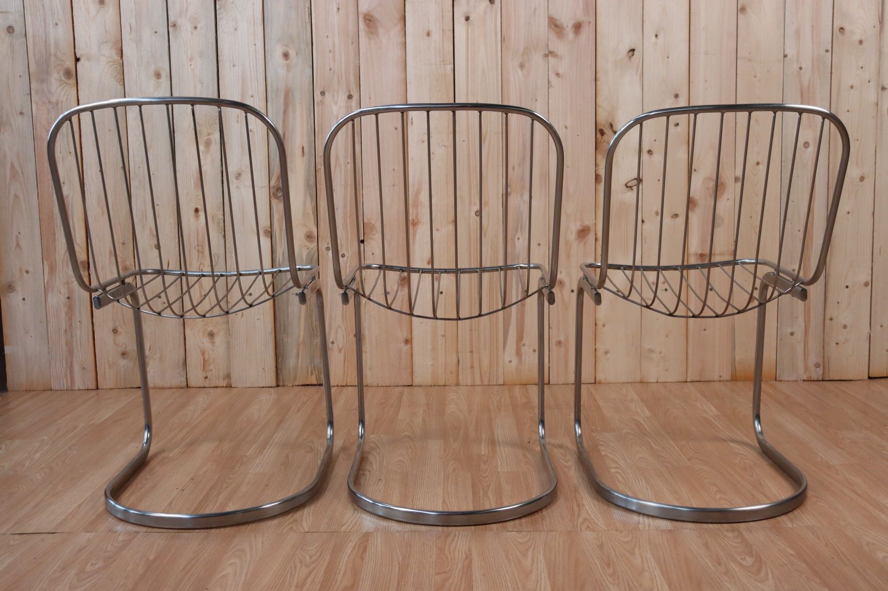 Series of 6 tubular steel chairs