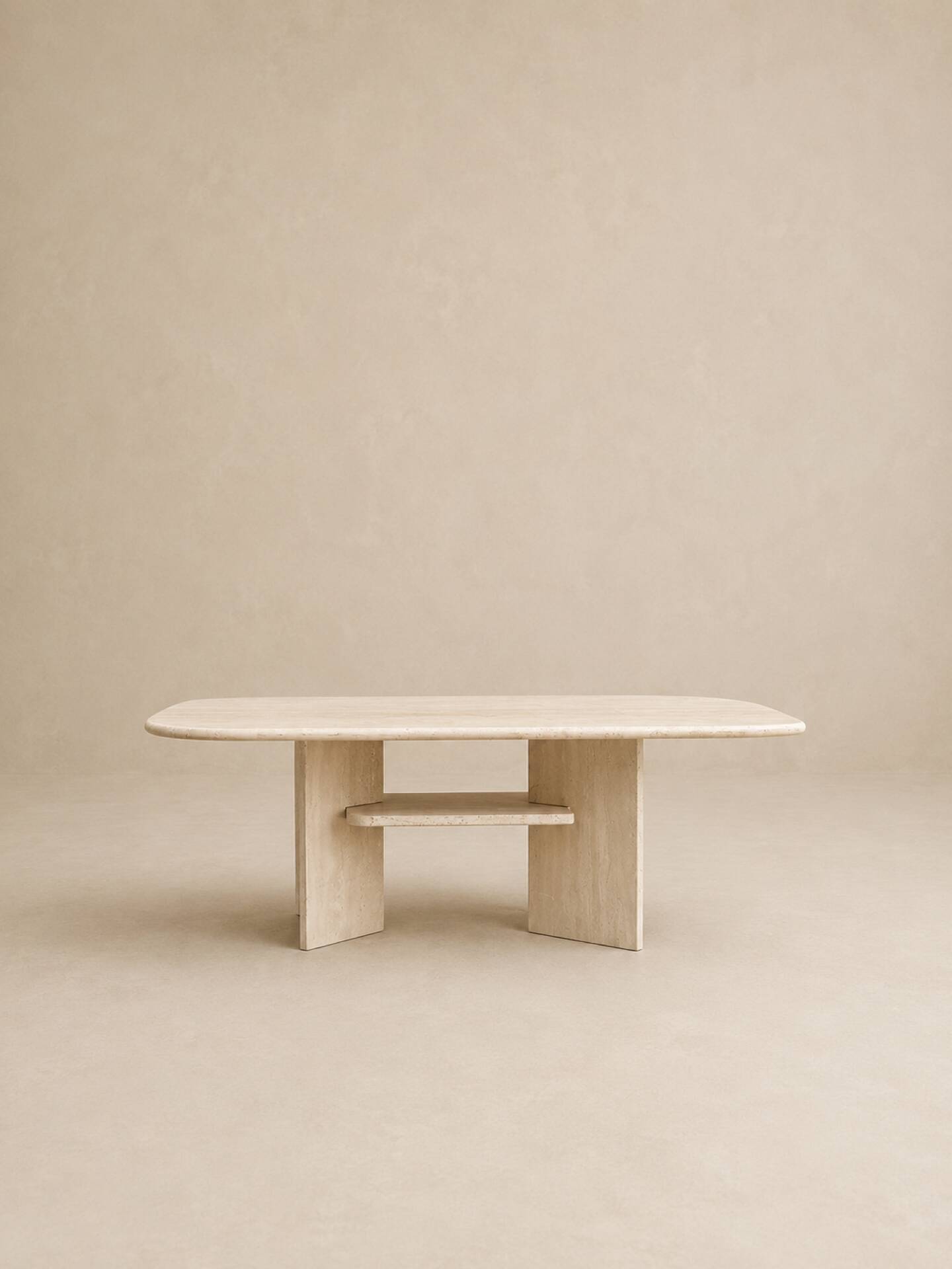 Vintage sculptural coffee table in travertine, 1980s.