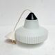 This decorative opal glass lamp is a design by Louis Kalff for Philips. The