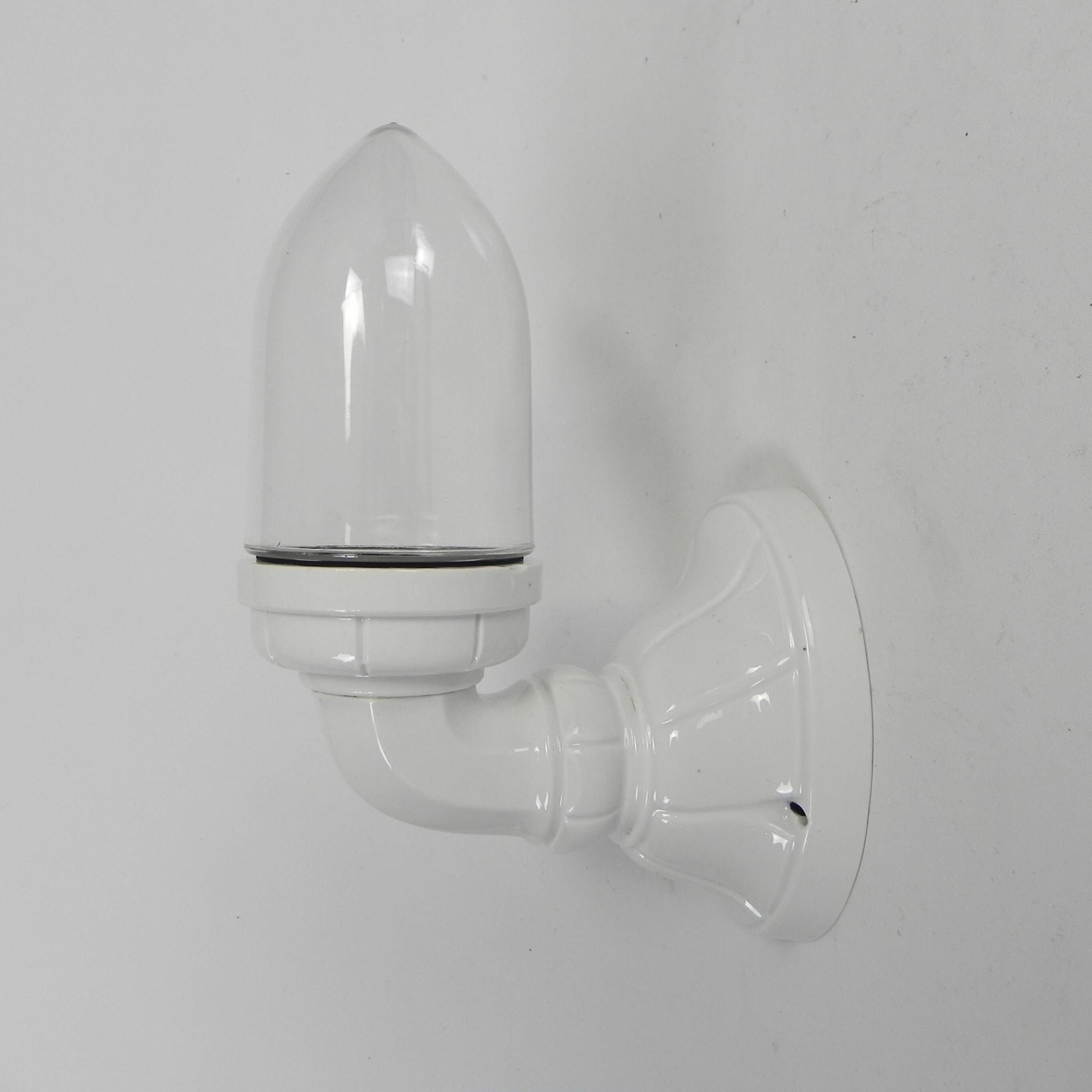 Wall lamp in porcelain with a transparent glass shade, 1930s.