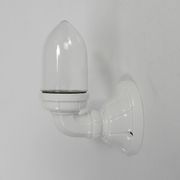 Wall lamp in porcelain with a transparent glass shade, 1930s.